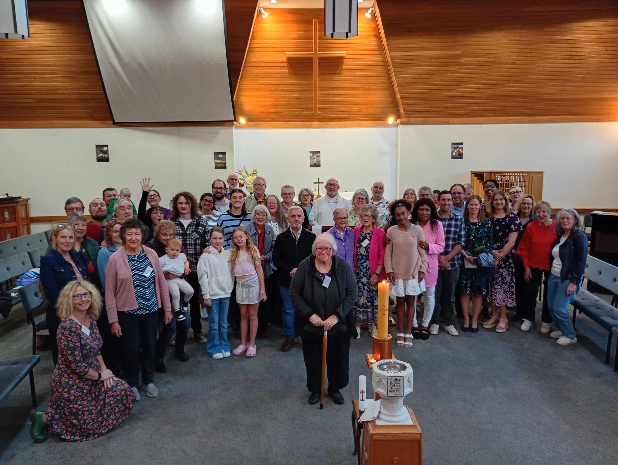 The congregation pose for a photo